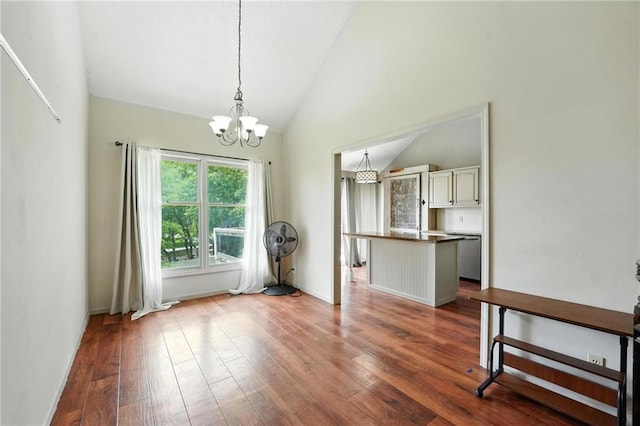 906 N Cedarcrest Dr, Olathe, KS 66061 - dining space featuring vaulted ceiling, a chandelier, and wood-type flooring