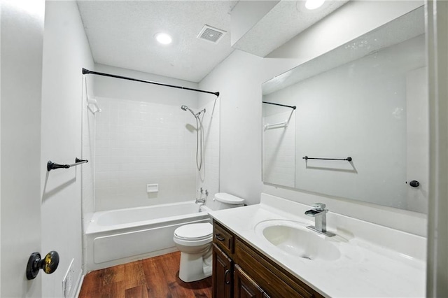 906 N Cedarcrest Dr, Olathe, KS 66061 - full bathroom featuring wood finished floors, vanity, shower / bathtub combination, and recessed lighting