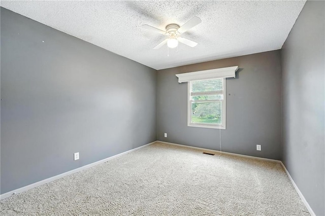 906 N Cedarcrest Dr, Olathe, KS 66061 - carpeted empty room featuring ceiling fan and a textured ceiling
