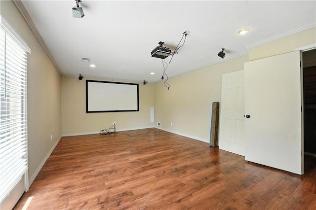 906 N Cedarcrest Dr, Olathe, KS 66061 - cinema featuring crown molding, wood finished floors, and recessed lighting