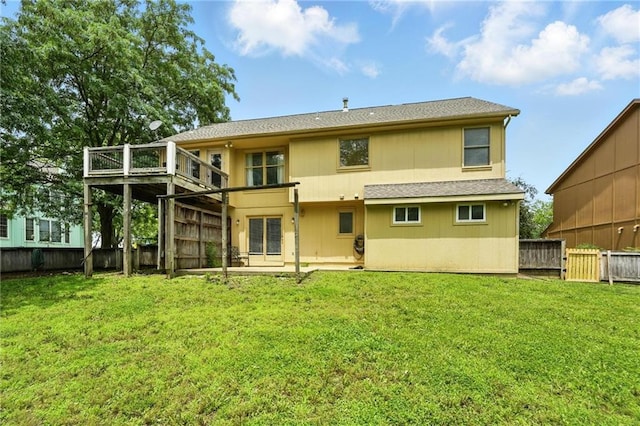 906 N Cedarcrest Dr, Olathe, KS 66061 - rear view of house featuring a fenced backyard and a shingled roof