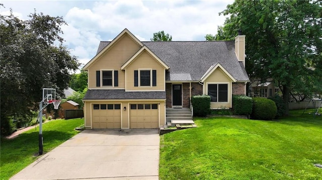 906 N Cedarcrest Dr, Olathe, KS 66061 - tri-level home with a garage, concrete driveway, a front lawn, a chimney, and roof with shingles