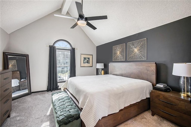 bedroom featuring a ceiling fan, a textured ceiling, carpet floors, baseboards, and vaulted ceiling with beams