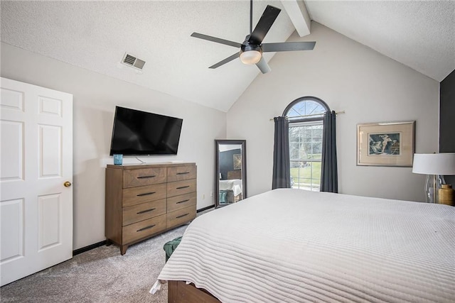 bedroom with a ceiling fan, visible vents, carpet floors, lofted ceiling with beams, and a textured ceiling