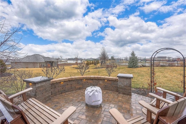 view of patio featuring fence