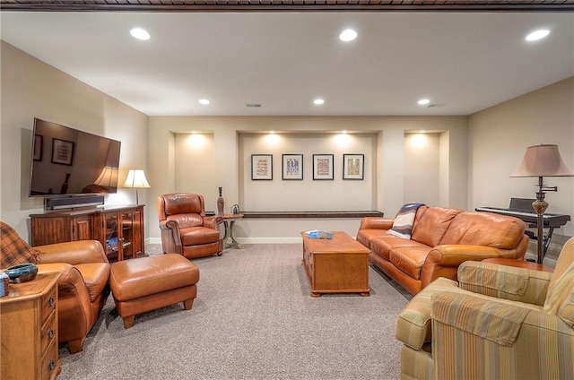 living room with carpet, visible vents, baseboards, and recessed lighting