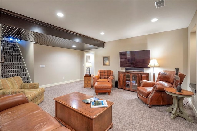 carpeted living room featuring stairway, baseboards, visible vents, and recessed lighting