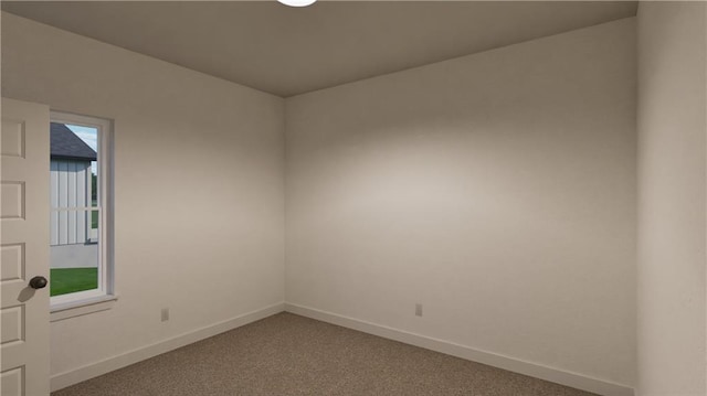 10605 N Jefferson St, Kansas City, MO 64155 - carpeted empty room with baseboards