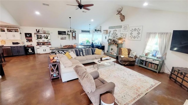 1147 Fern Rd, Fort Scott, KS 66701 - living area with finished concrete floors, a ceiling fan, recessed lighting, and high vaulted ceiling
