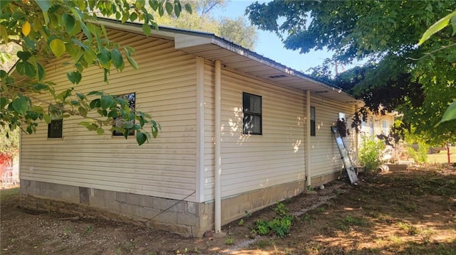 1147 Fern Rd, Fort Scott, KS 66701 - view of home's exterior featuring crawl space