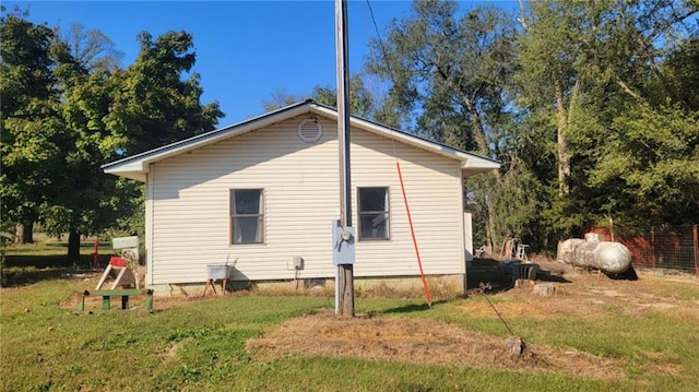 1147 Fern Rd, Fort Scott, KS 66701 - view of side of property with a lawn