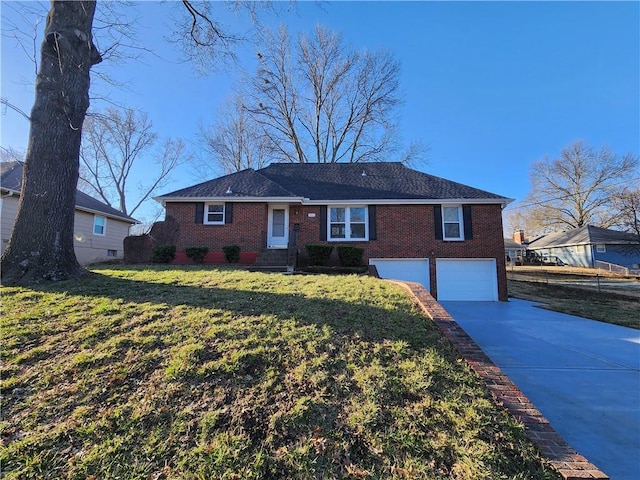 ranch-style home with a front lawn, an attached garage, brick siding, and driveway