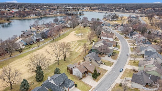 aerial view featuring a water view and a residential view