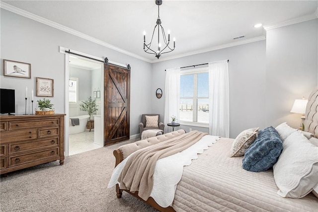 bedroom with visible vents, crown molding, carpet, and a barn door