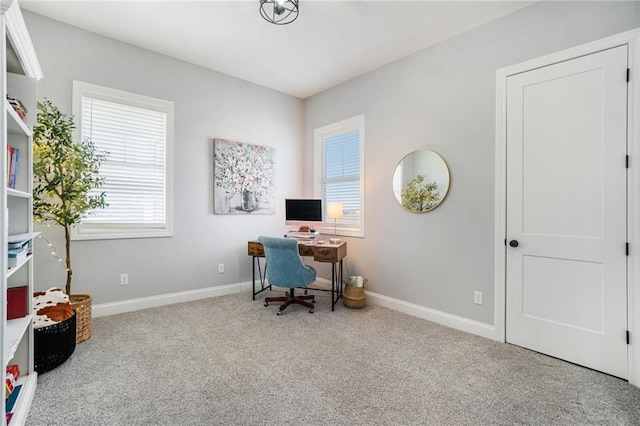 home office featuring baseboards and carpet floors