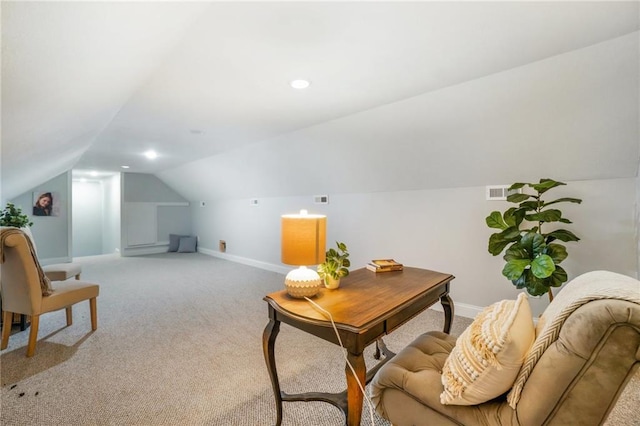 office featuring baseboards, carpet floors, visible vents, and vaulted ceiling