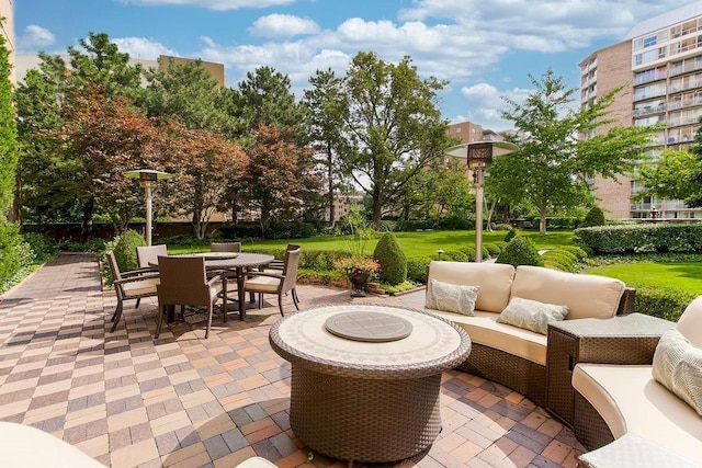 view of patio / terrace featuring an outdoor living space and outdoor dining area