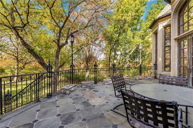 view of patio featuring outdoor dining area