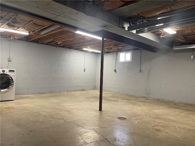 basement with washer / dryer