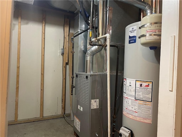 utility room featuring gas water heater