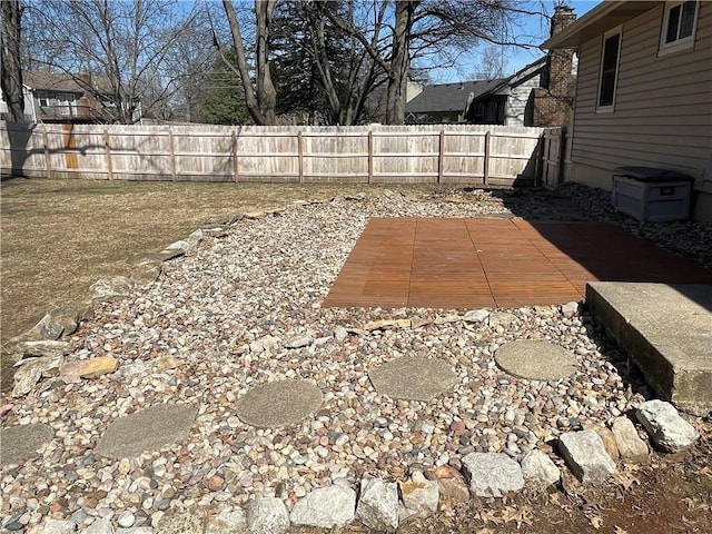 view of yard with a patio and fence