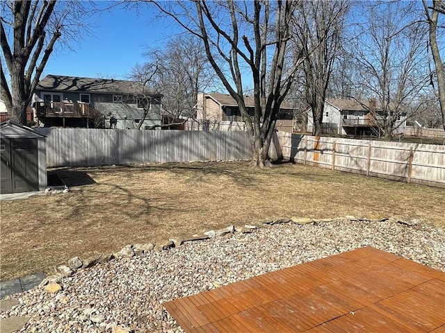 view of yard with a residential view and a fenced backyard