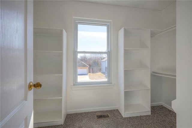 bathroom featuring visible vents and baseboards