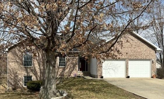 view of front facade with an attached garage and driveway