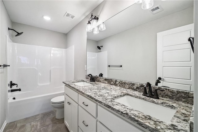 full bath with toilet, washtub / shower combination, visible vents, and a sink