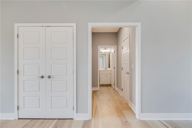7009 NE 103rd St, Kansas City, MO 64156 - unfurnished bedroom with a closet and light wood-type flooring