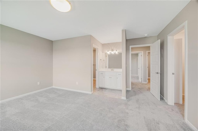 7009 NE 103rd St, Kansas City, MO 64156 - unfurnished bedroom with light carpet and a chandelier
