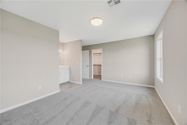 7009 NE 103rd St, Kansas City, MO 64156 - spare room featuring light carpet