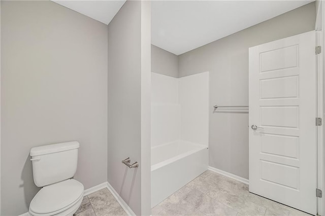 7009 NE 103rd St, Kansas City, MO 64156 - bathroom with toilet and baseboards