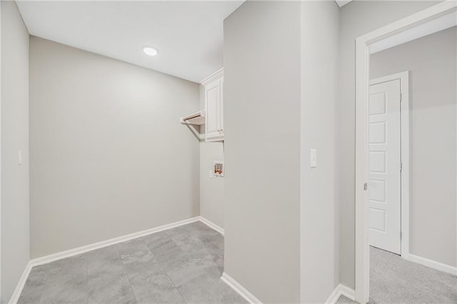 7009 NE 103rd St, Kansas City, MO 64156 - laundry room featuring cabinet space and washer hookup