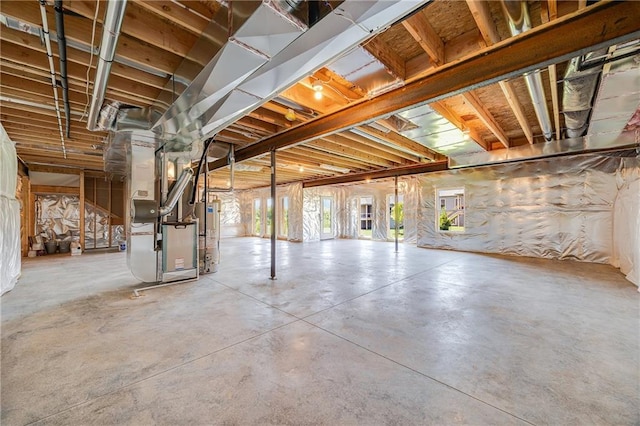 7009 NE 103rd St, Kansas City, MO 64156 - basement featuring heating unit and gas water heater