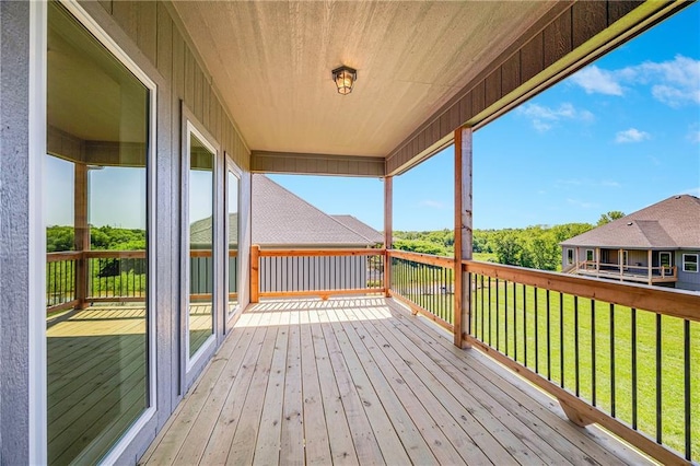 7009 NE 103rd St, Kansas City, MO 64156 - wooden terrace featuring a lawn