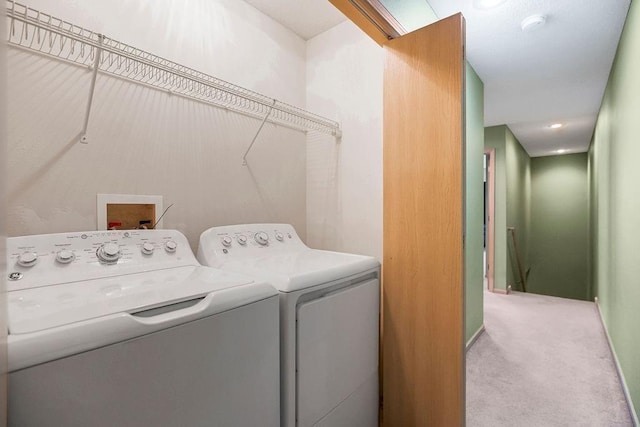 laundry area featuring carpet floors, independent washer and dryer, and laundry area