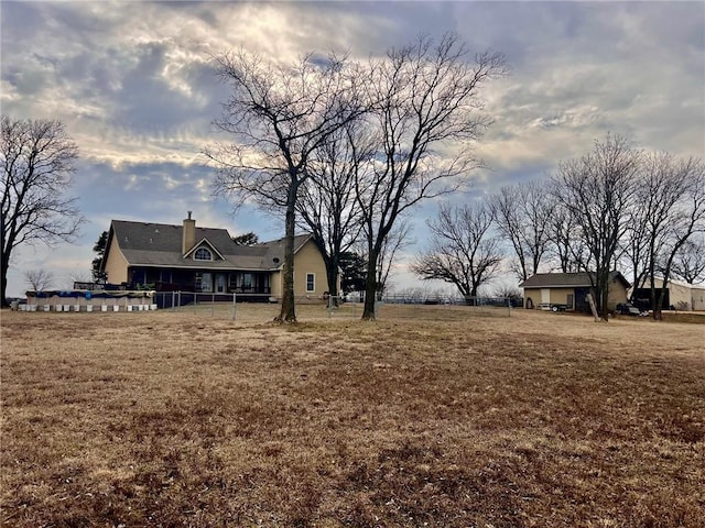 view of yard with fence