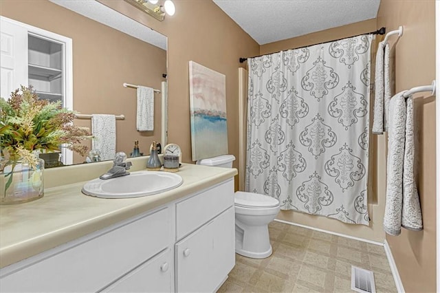 bathroom with visible vents, toilet, shower / bath combo, tile patterned floors, and vanity