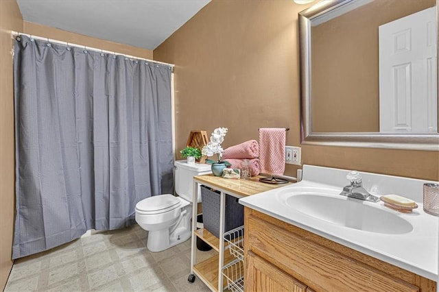 full bathroom with tile patterned floors, toilet, vanity, and a shower with curtain