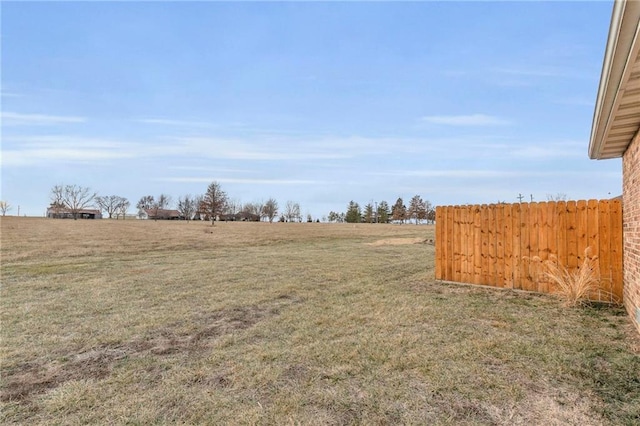 view of yard with fence