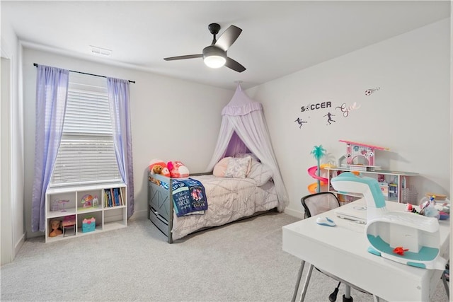 bedroom with a ceiling fan, carpet, visible vents, and baseboards