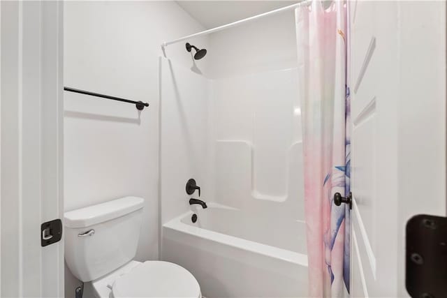 full bath with toilet and shower / bath combo