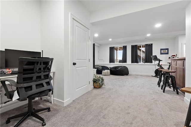 interior space featuring recessed lighting and baseboards