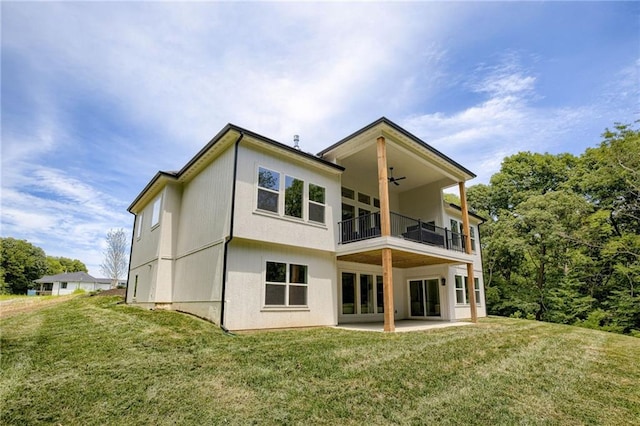 12435 NW Arbor Way, Platte City, MO 64079 - back of property featuring a balcony, a yard, a patio, and ceiling fan