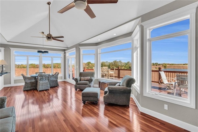 sunroom with vaulted ceiling and a wealth of natural light