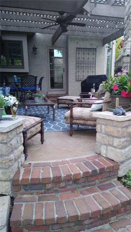 view of patio featuring a pergola