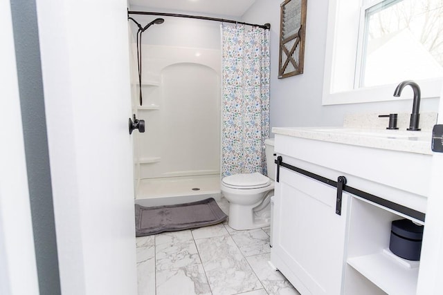 bathroom with toilet, marble finish floor, a shower stall, and vanity