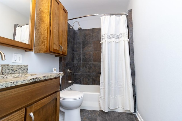 bathroom with vanity, shower / bath combination with curtain, and toilet