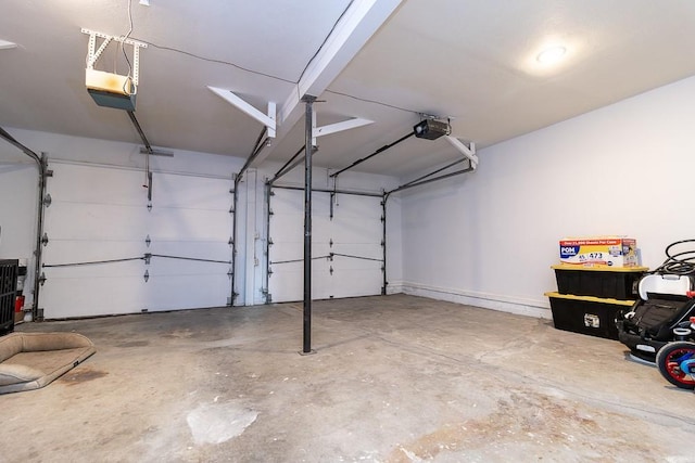 garage featuring a garage door opener